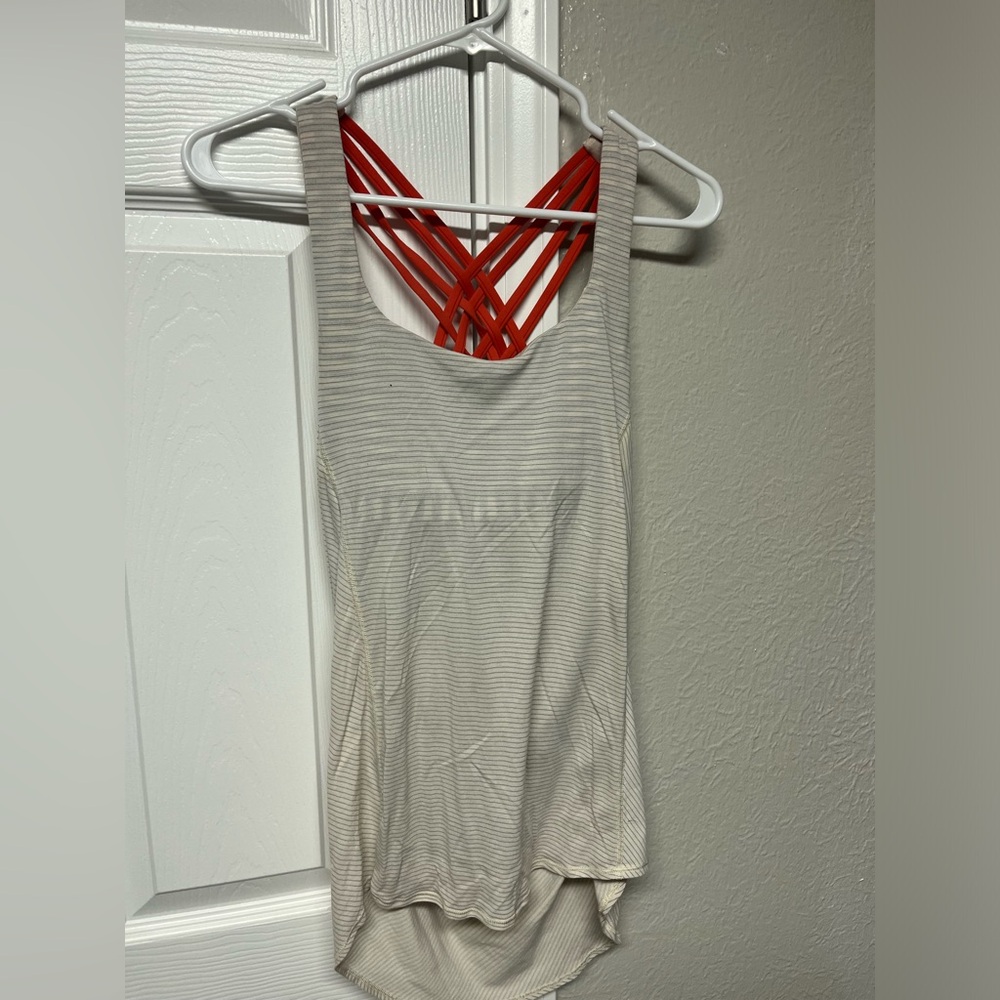 Lululemon tank. Size 4.  Fair used condition.  No tears or stains.